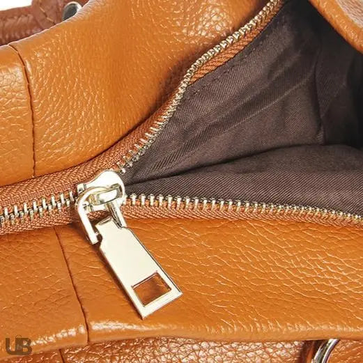 Zanzibar en cuir Leather Goods Co