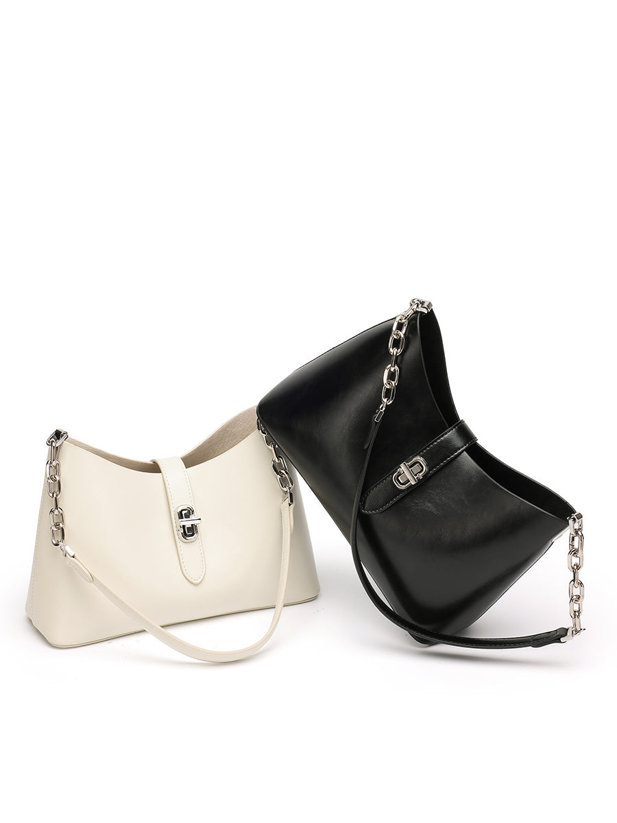 Les deux coloris du sac Fanny : noir et crème